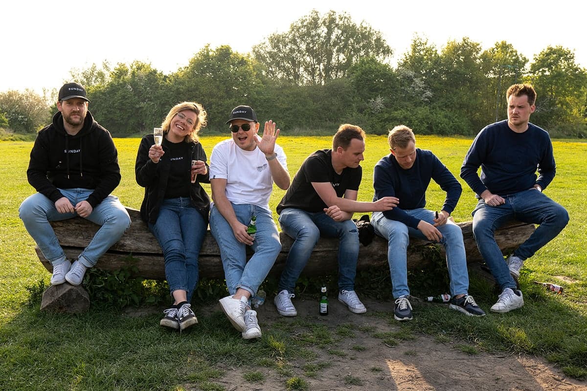 Sunday team relaxing outdoors together