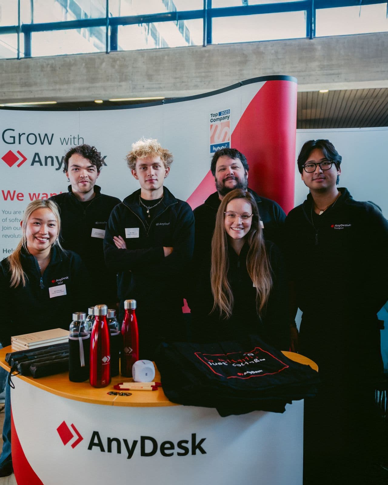 AnyDesk team wearing branded apparel