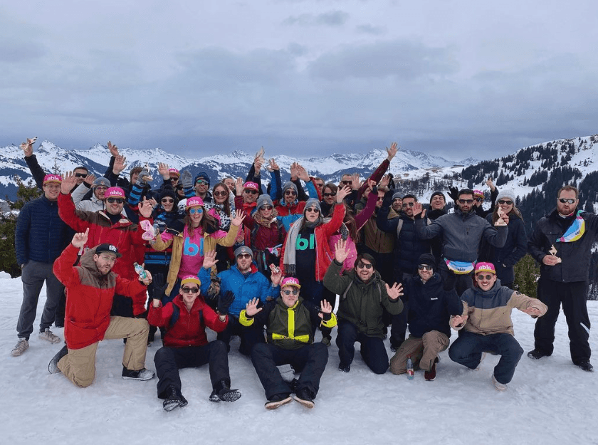 Team event with branded beanies and gear