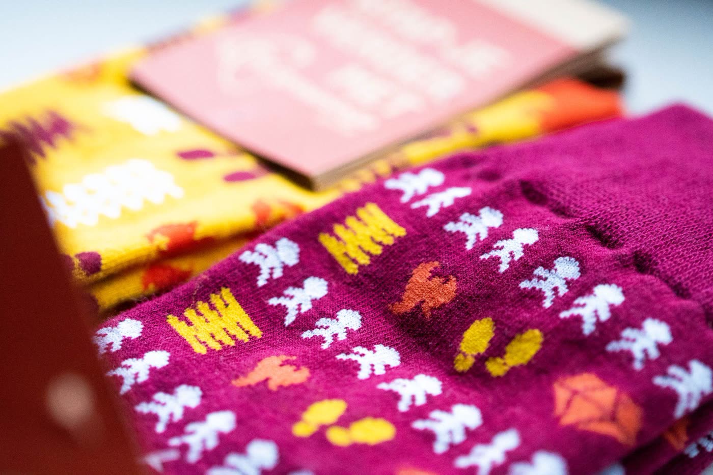 Colorful branded socks with all-over patterns