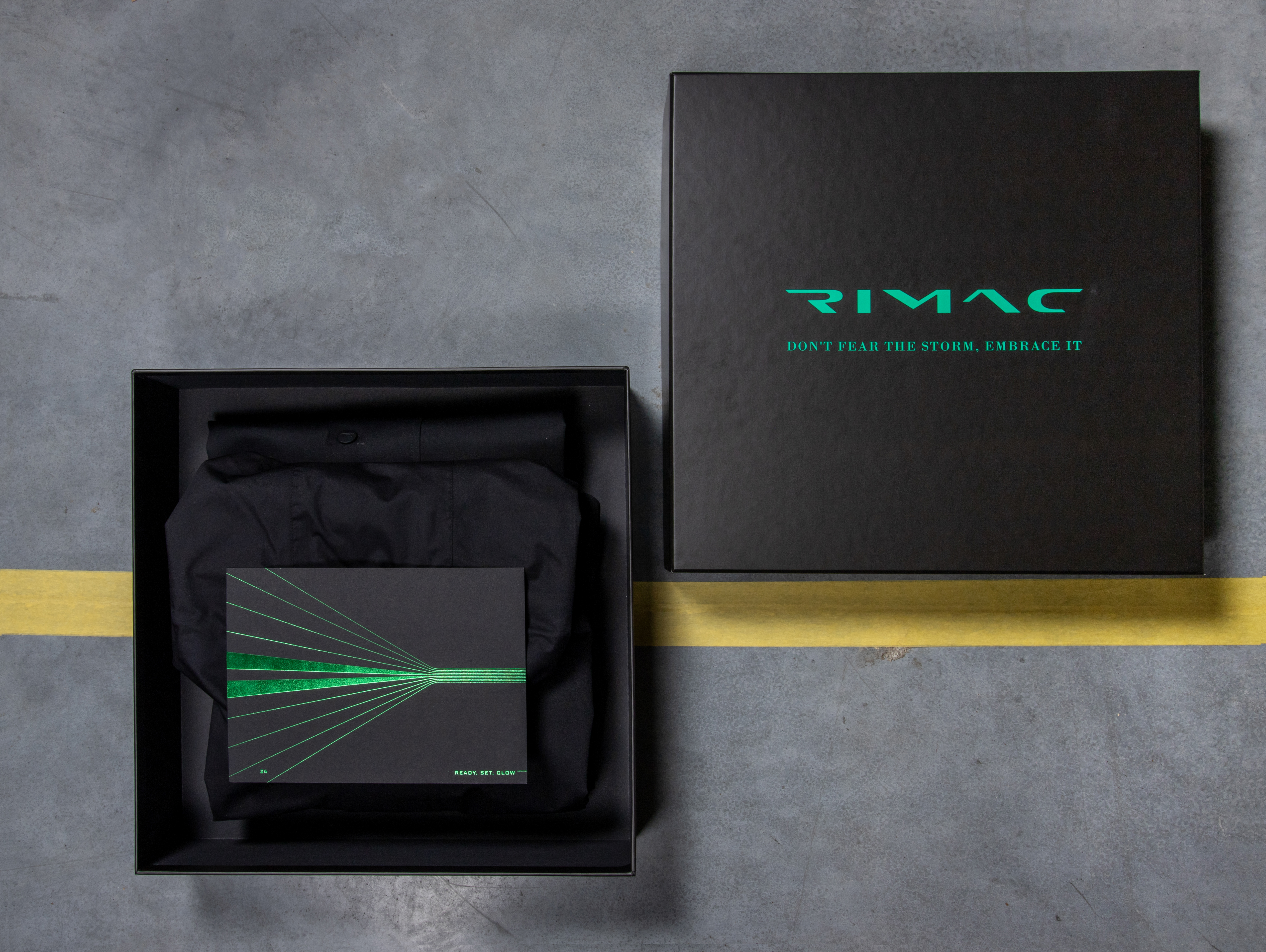 Bugatti Rimac branded merchandise at a car launch event