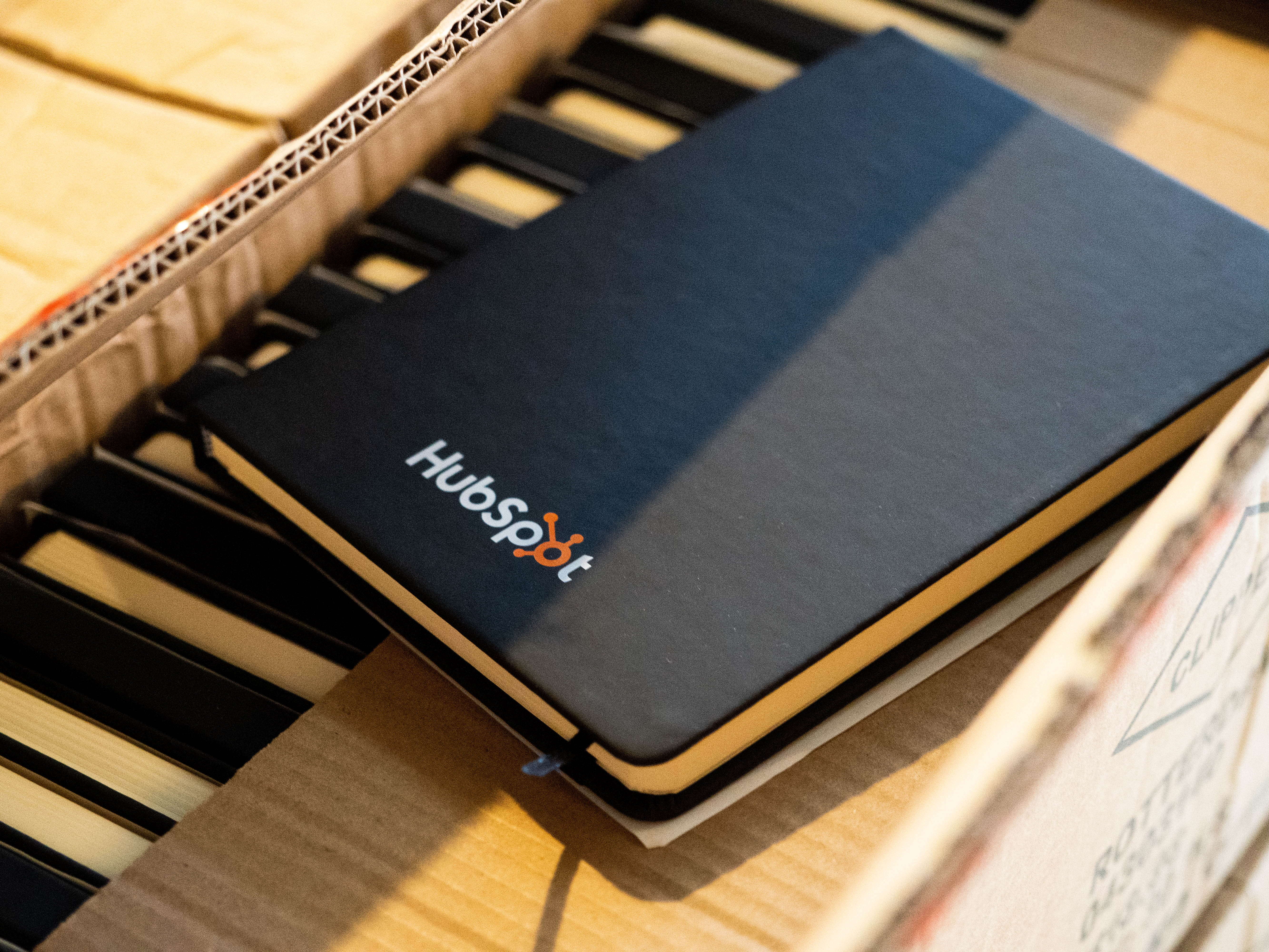 HubSpot team members with branded merchandise